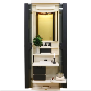 Open tall home safe with cream interior and multiple shelves, including a plant, desk area, and storage boxes inside.